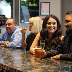 People drinking at a bar
